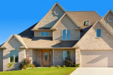 A beautiful house with green grass